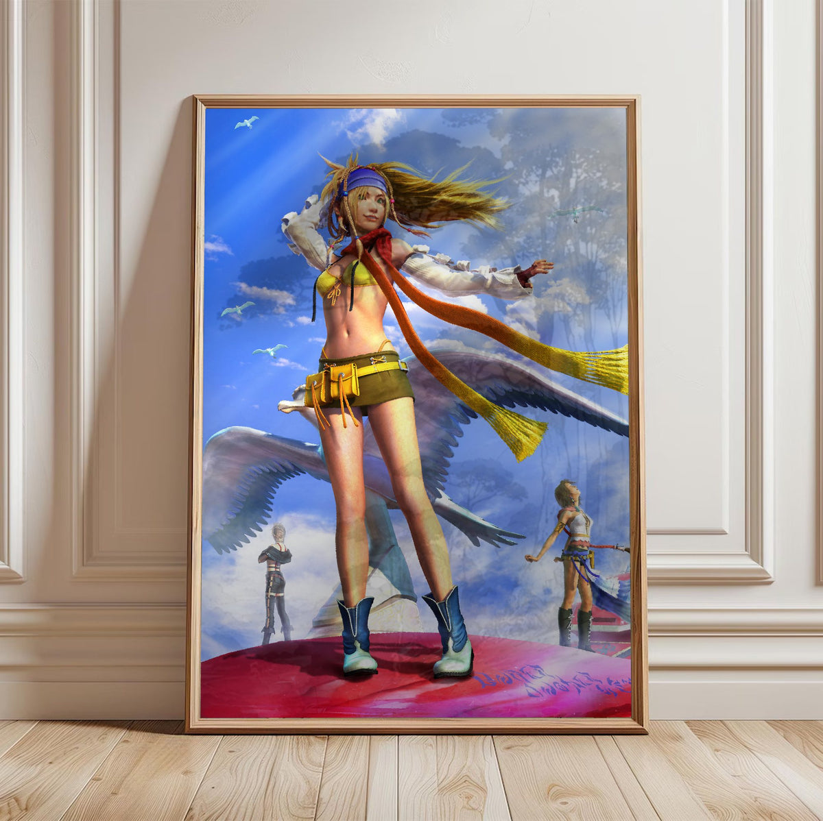 Final Fantasy X-2 Rikku Key Art poster in a light oak frame leaning against a white wall