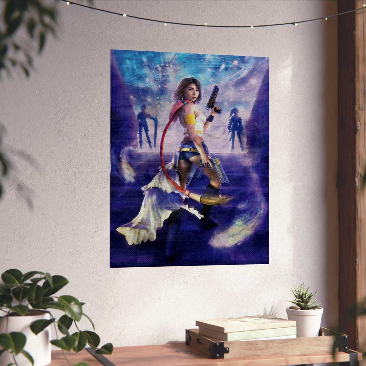 Final Fantasy X-2 Yuna Key Art poster unframed on a white wall above a desk
