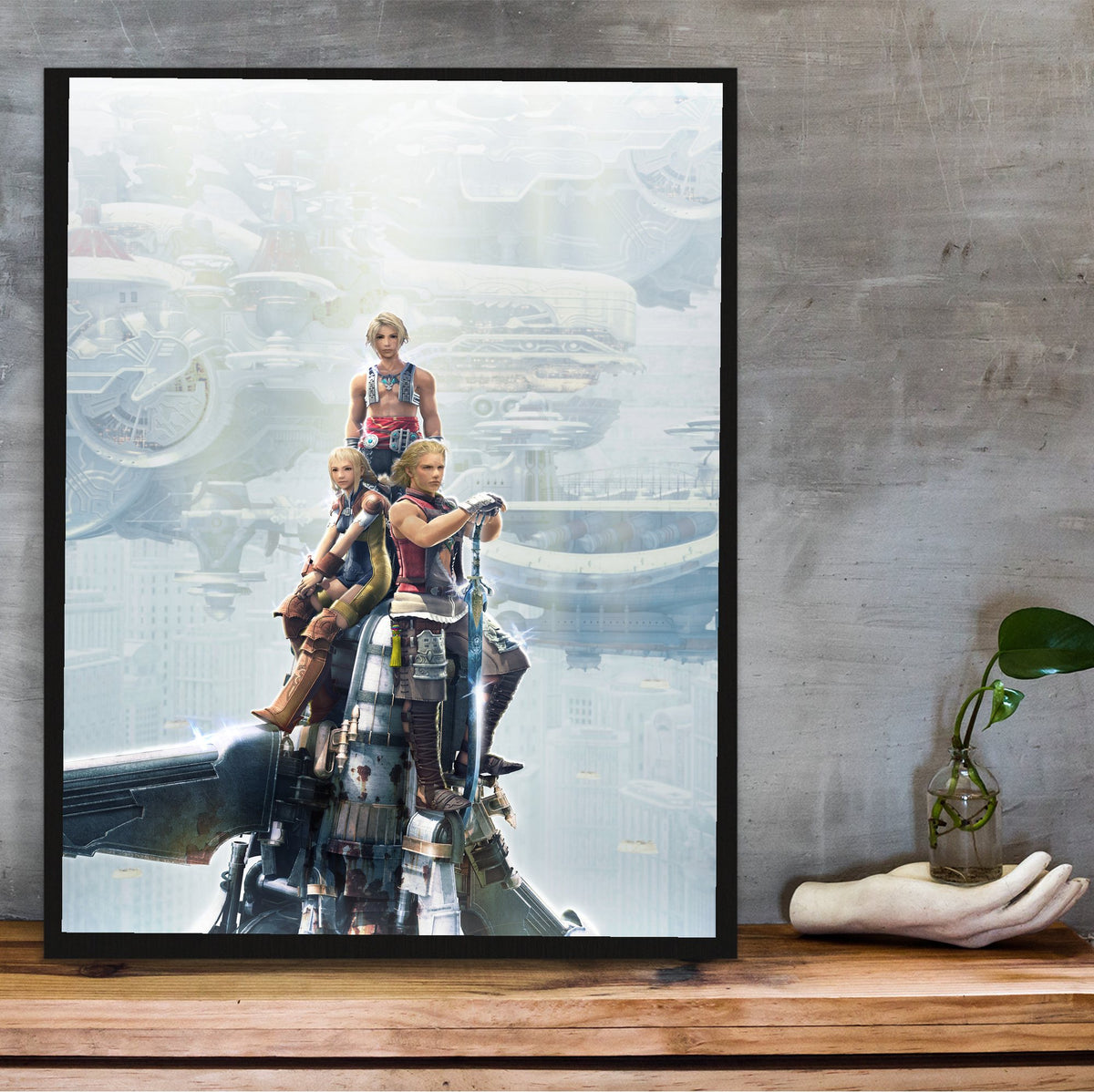 Final Fantasy XII Vaan Basch and Penelo poster in a black frame on a wooden shelf against concrete