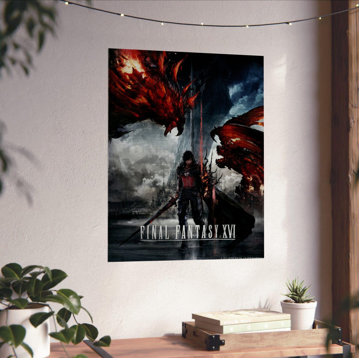 Final Fantasy XVI Key Art poster unframed on a white wall above a desk
