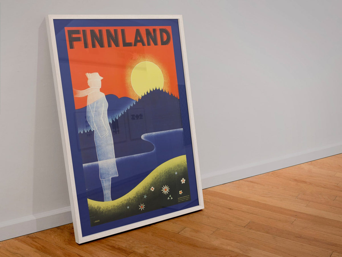 Finnland poster in a white frame leaning against a wall