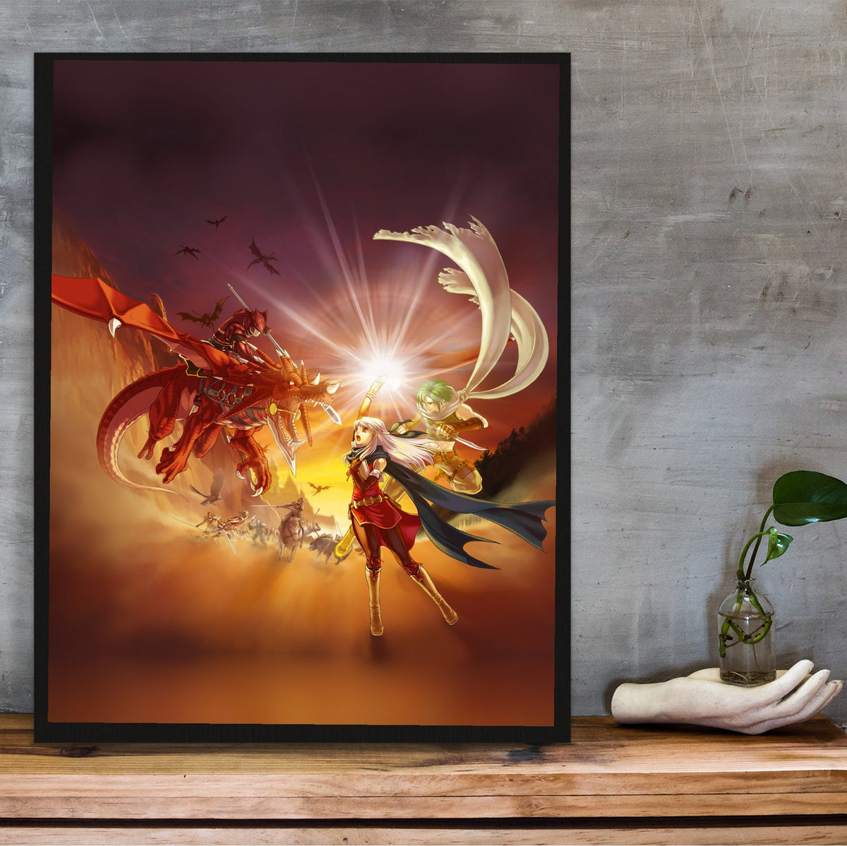 Fire Emblem Radiant Dawn Box Art poster in a black frame on a wooden shelf against concrete (vertical)