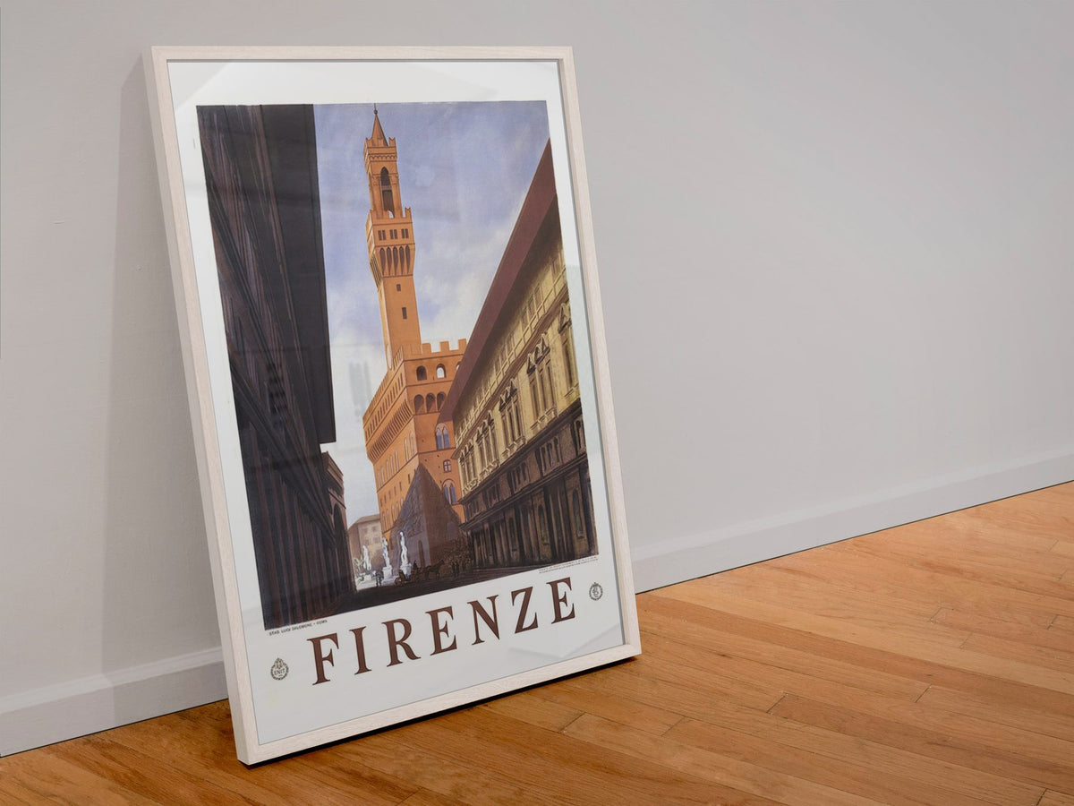 Firenze Palazzo Vecchio poster in a white frame leaning against a wall