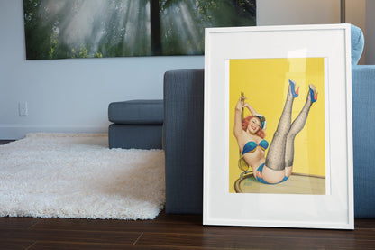 First Mate poster leaning beside a blue sofa