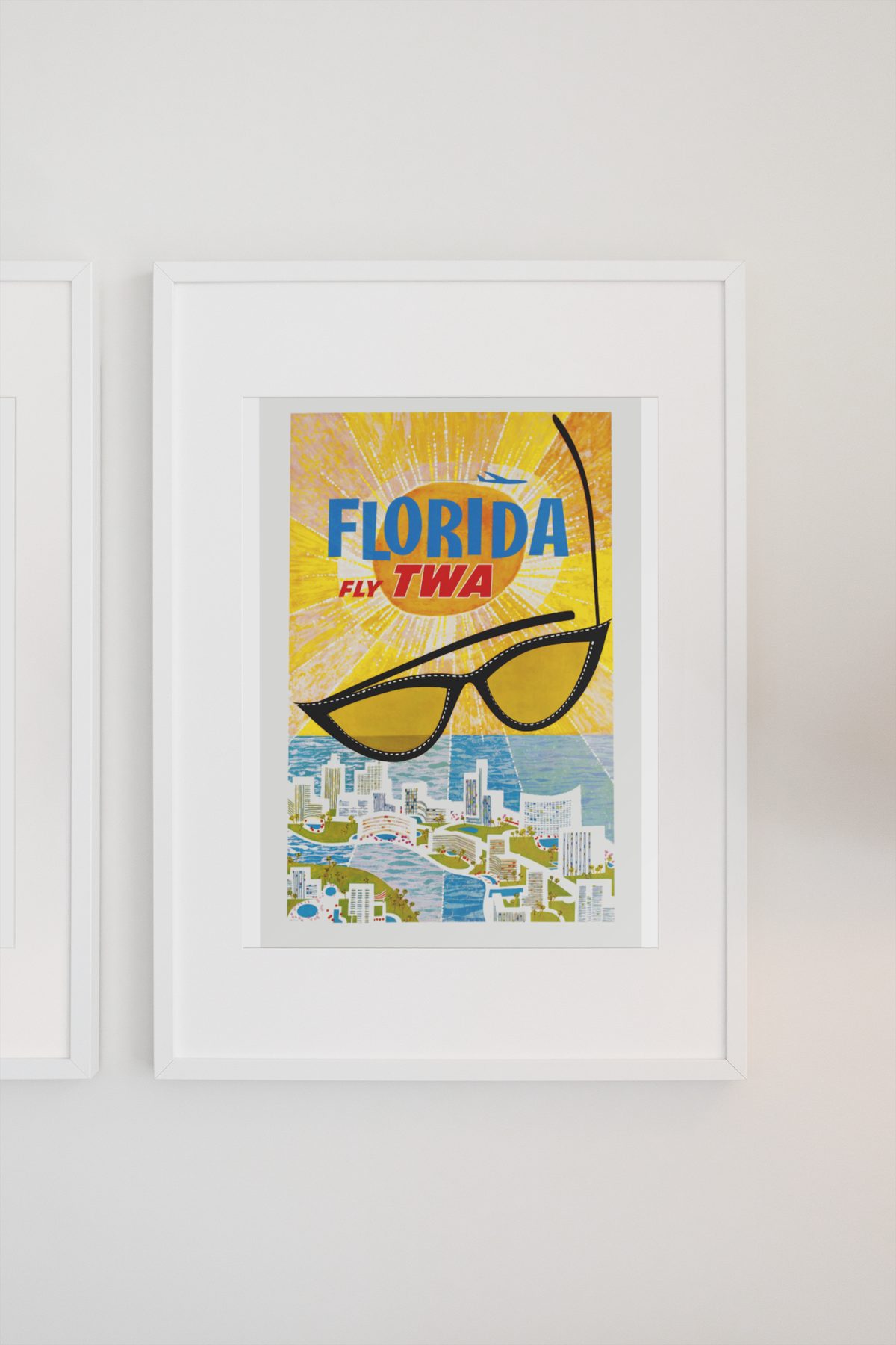 Florida Fly TWA poster on a light wall