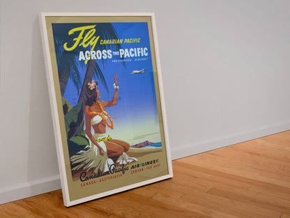 Fly Across the Pacific Canadian Pacific poster in a white frame leaning against a wall