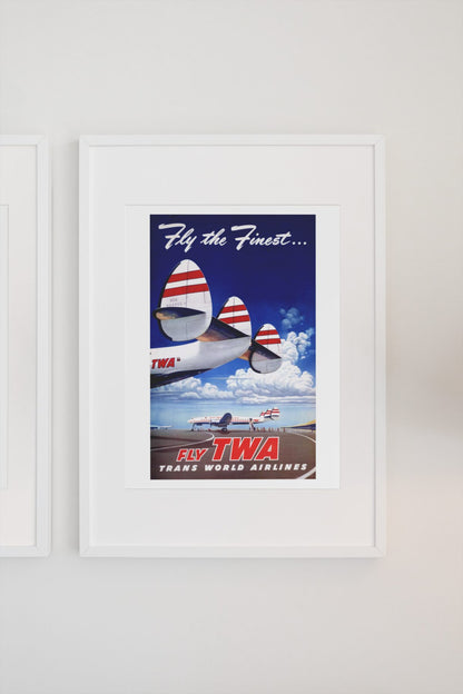 Fly the Finest Fly TWA poster on a light wall