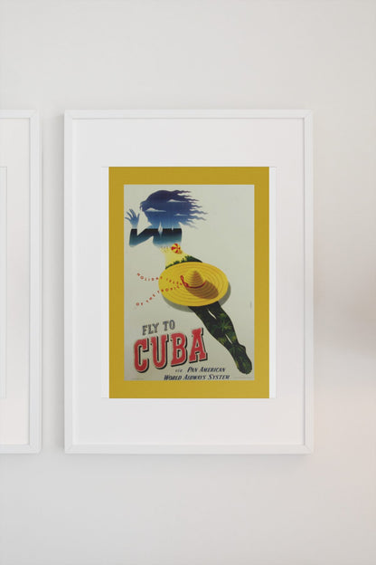 Fly to Cuba Pan American poster on a light wall