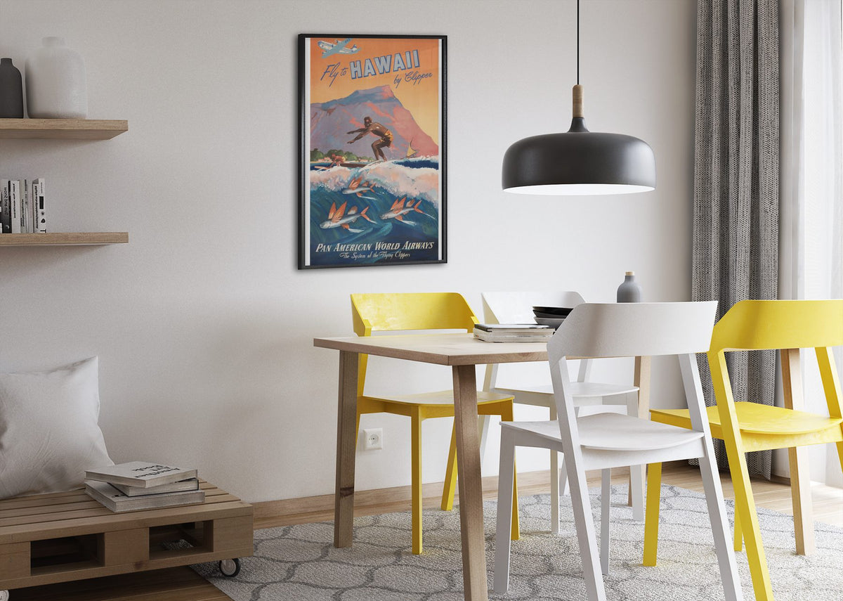 Fly to Hawaii by Clipper poster framed above a dining table