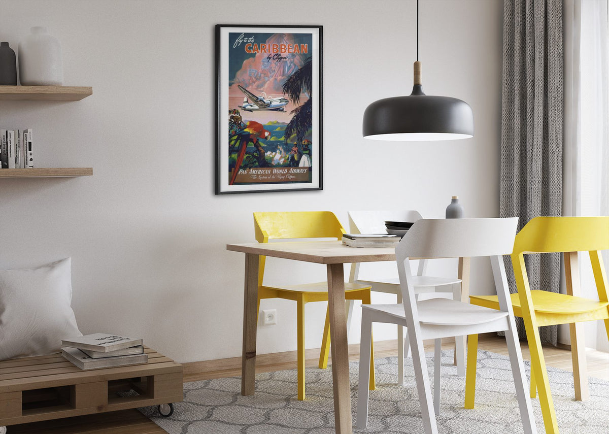 Fly to the Caribbean by Clipper Pan American poster framed above a dining table