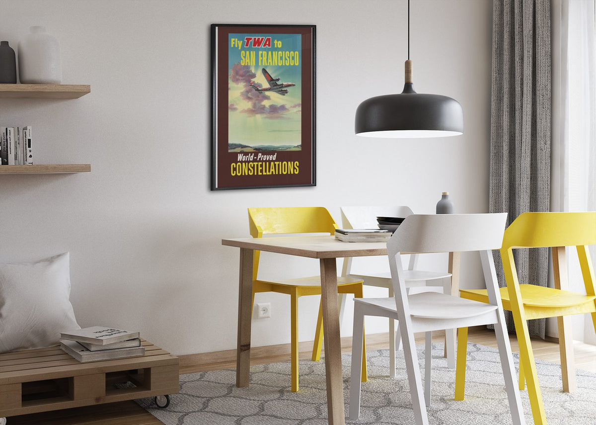 Fly TWA to San Francisco Constellations poster framed above a dining table
