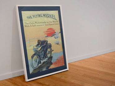 The Flying Merkel 1913 poster in a white frame leaning against a wall