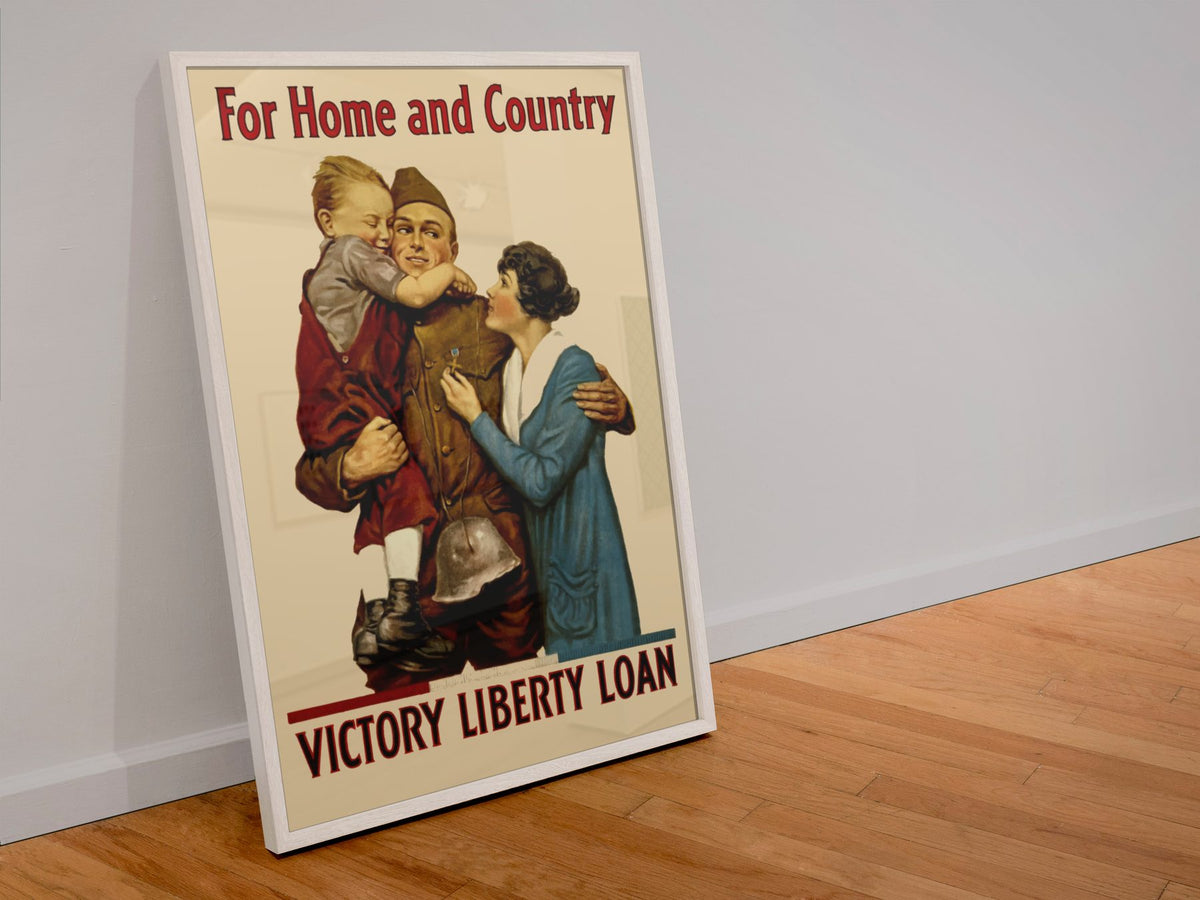 For Home and Country — Victory Liberty Loan poster in a white frame leaning against a wall