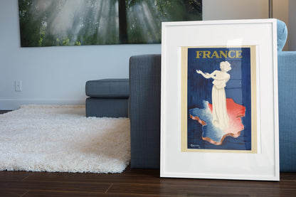 France Marianne poster leaning beside a blue sofa