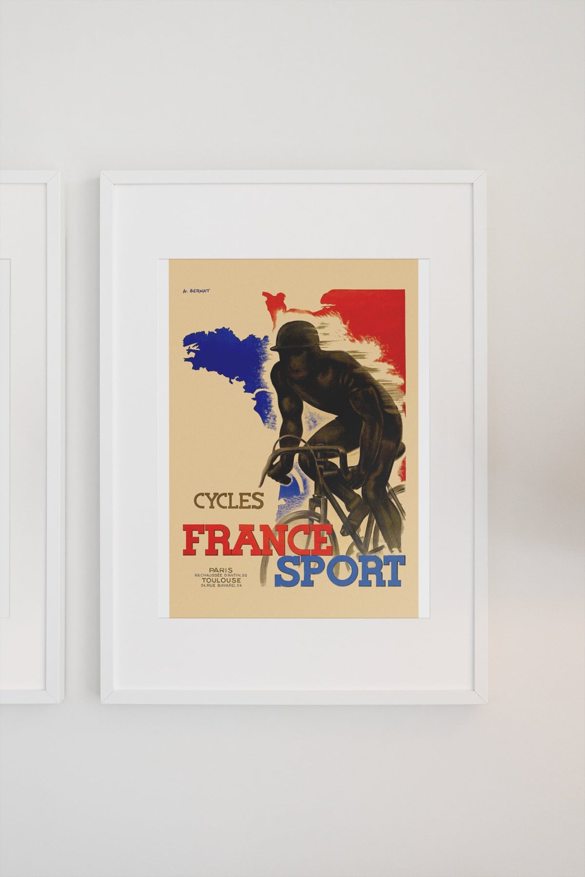 France Sport Cycles poster on a light wall
