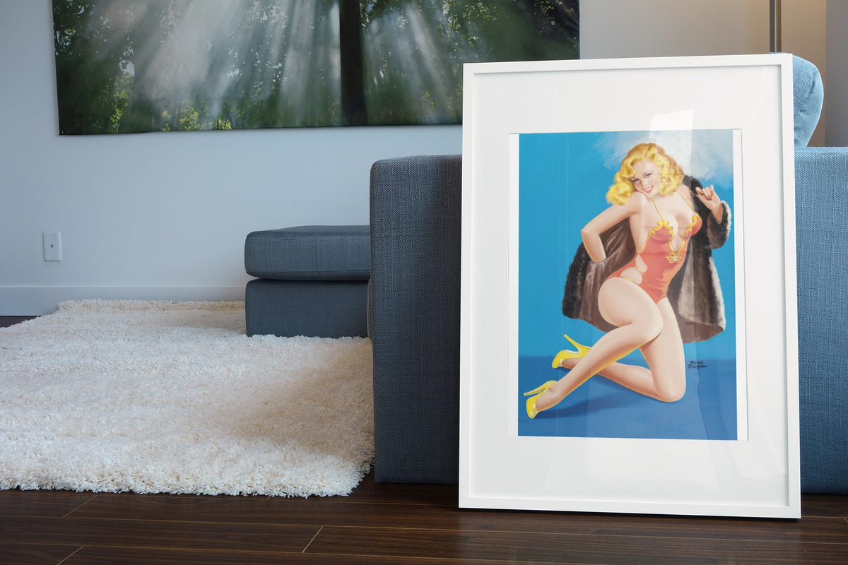 Fur Real poster leaning beside a blue sofa