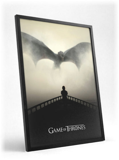 Game of Thrones Dragon Silhouette Art poster in a black frame with glass leaning against a wall