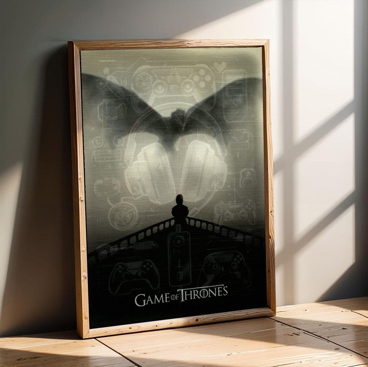 Game of Thrones Dragon Silhouette Art poster in an oak frame leaning on a wooden floor