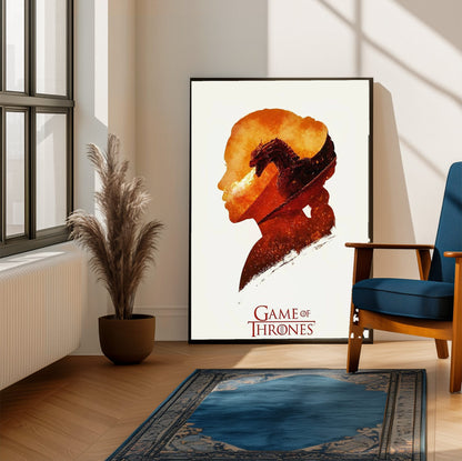 Game of Thrones Silhouette Art poster framed beside a blue armchair in a sunlit room