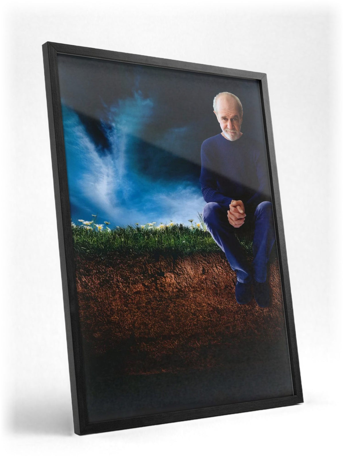 George Carlin: Life Is Worth Losing (2005) Movie Key Art poster in a black frame with glass leaning against a wall