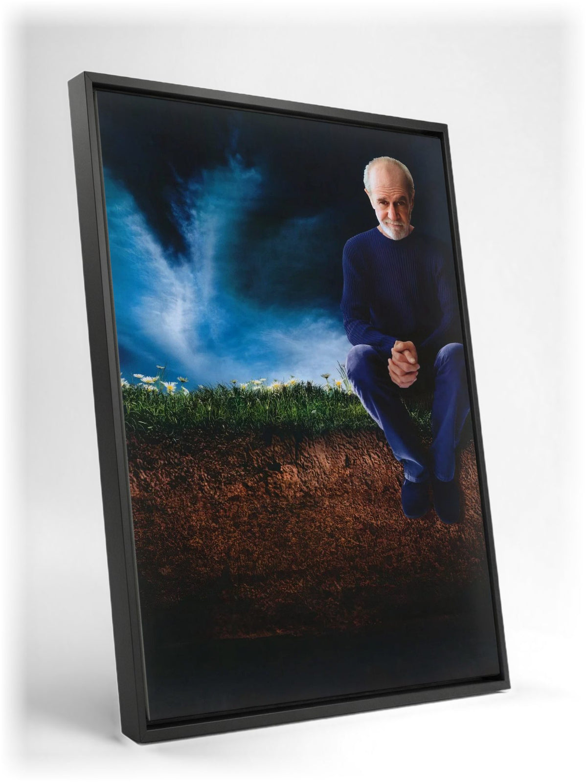George Carlin: Life Is Worth Losing (2005) Movie Key Art as a black floater framed canvas leaning against a wall