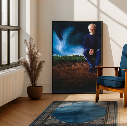 George Carlin: Life Is Worth Losing (2005) Movie Key Art poster framed beside a blue armchair in a sunlit room