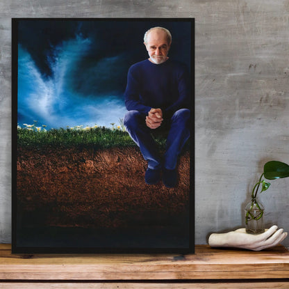 George Carlin: Life Is Worth Losing (2005) Movie Key Art poster in a black frame on a wooden shelf against concrete