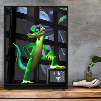 Gex: Enter the Gecko TV Wall Art poster in a black frame on a wooden shelf against concrete