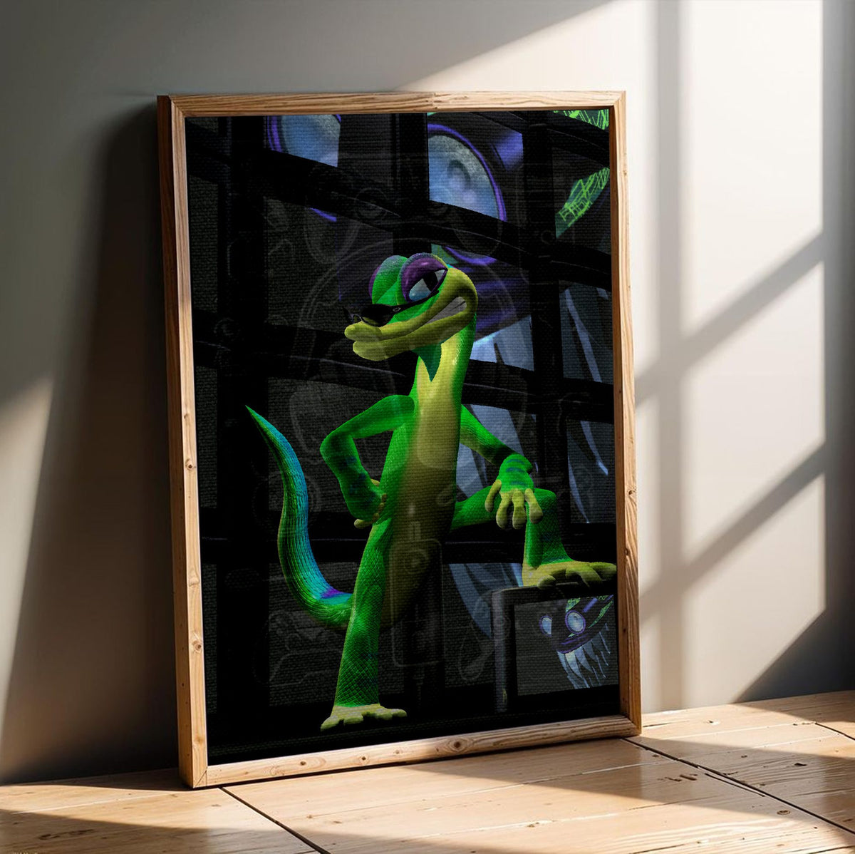 Gex: Enter the Gecko TV Wall Art poster in an oak frame leaning on a wooden floor