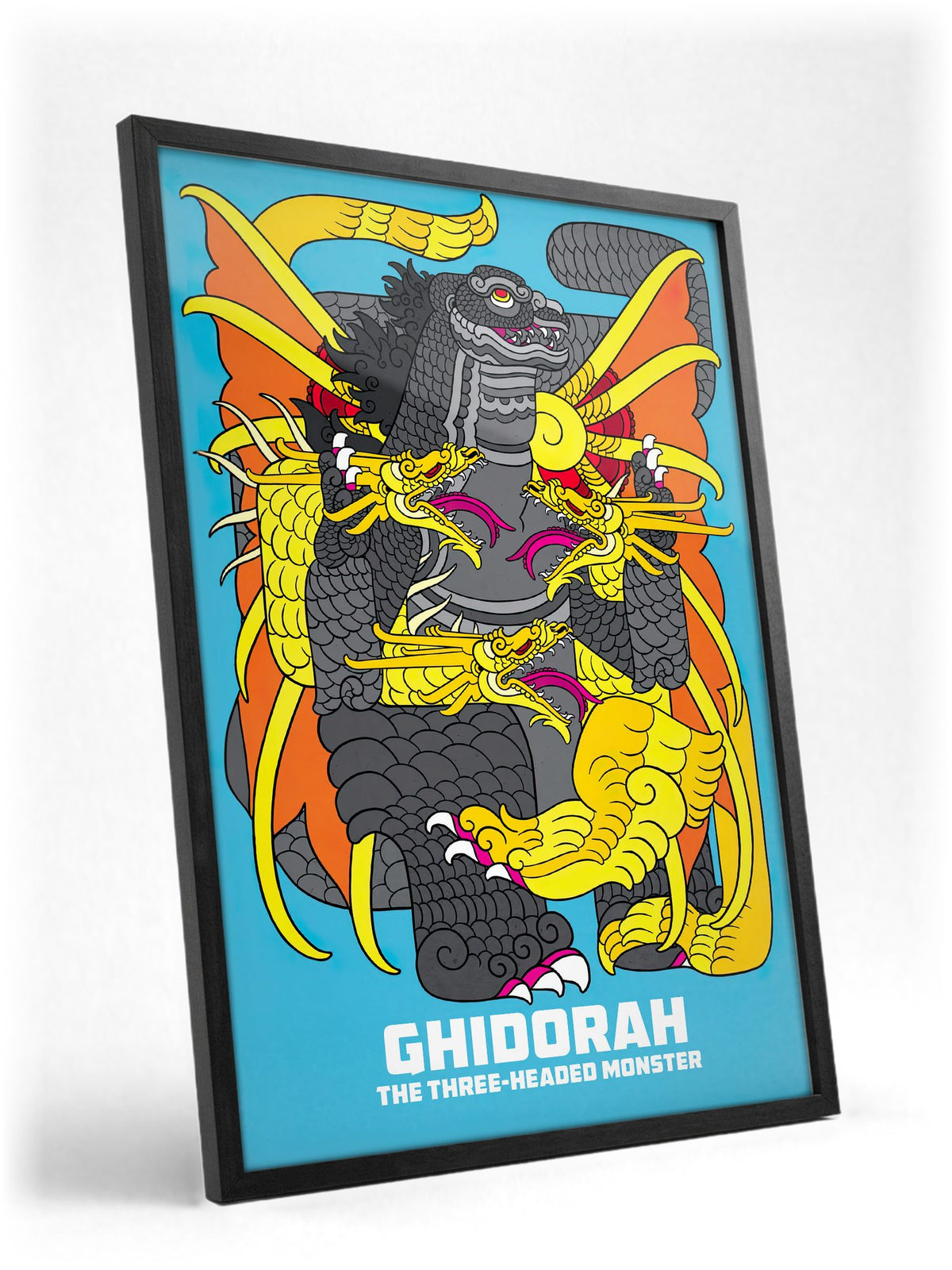 Ghidorah, the Three-Headed Monster (1964) Movie Illustrated Art poster in a black frame with glass leaning against a wall