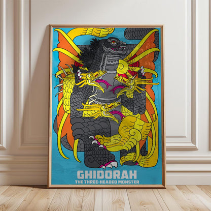 Ghidorah, the Three-Headed Monster (1964) Movie Illustrated Art poster in a light oak frame leaning against a white wall