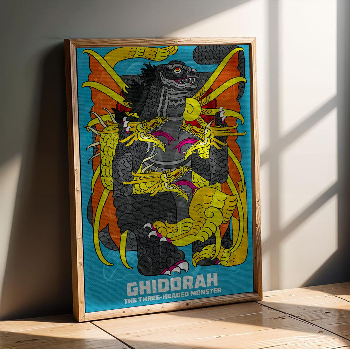 Ghidorah, the Three-Headed Monster (1964) Movie Illustrated Art poster in an oak frame leaning on a wooden floor