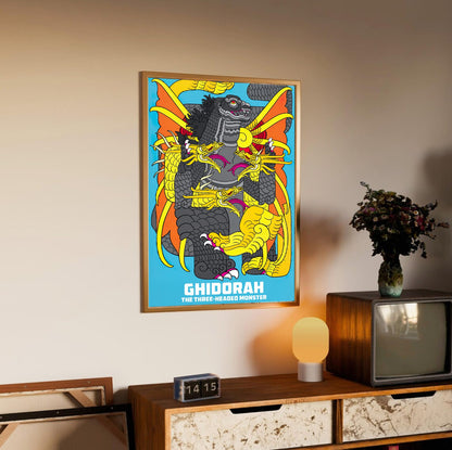 Ghidorah, the Three-Headed Monster (1964) Movie Illustrated Art poster in an oak frame above a sideboard