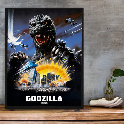 Godzilla 1985 (1985) Movie Key Art poster in a black frame on a wooden shelf against concrete