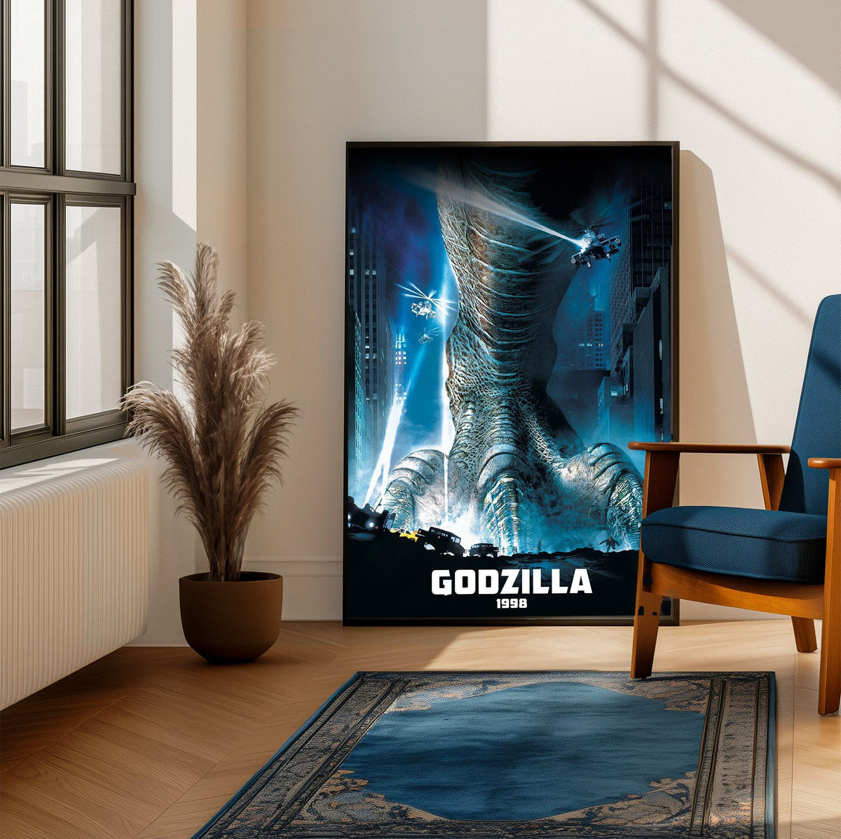 Godzilla (1998) Movie Key Art poster framed beside a blue armchair in a sunlit room