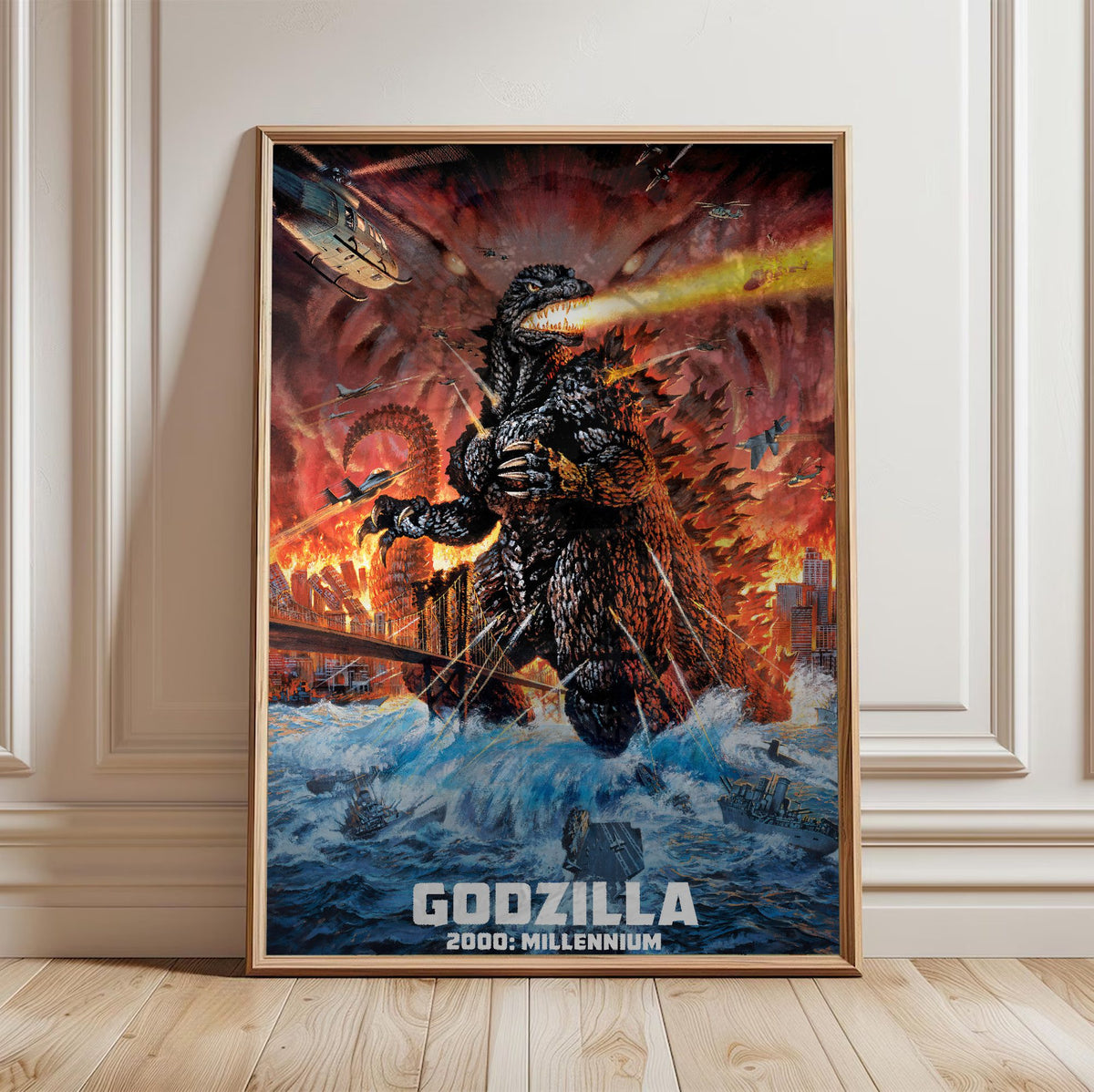 Godzilla 2000: Millennium (1999) Movie Key Art poster in a light oak frame leaning against a white wall