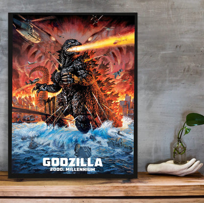 Godzilla 2000: Millennium (1999) Movie Key Art poster in a black frame on a wooden shelf against concrete