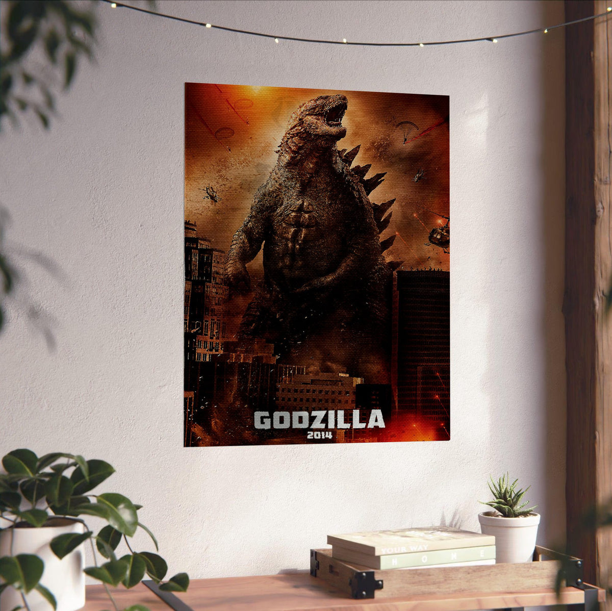 Godzilla (2014) Movie Key Art poster unframed on a white wall above a desk