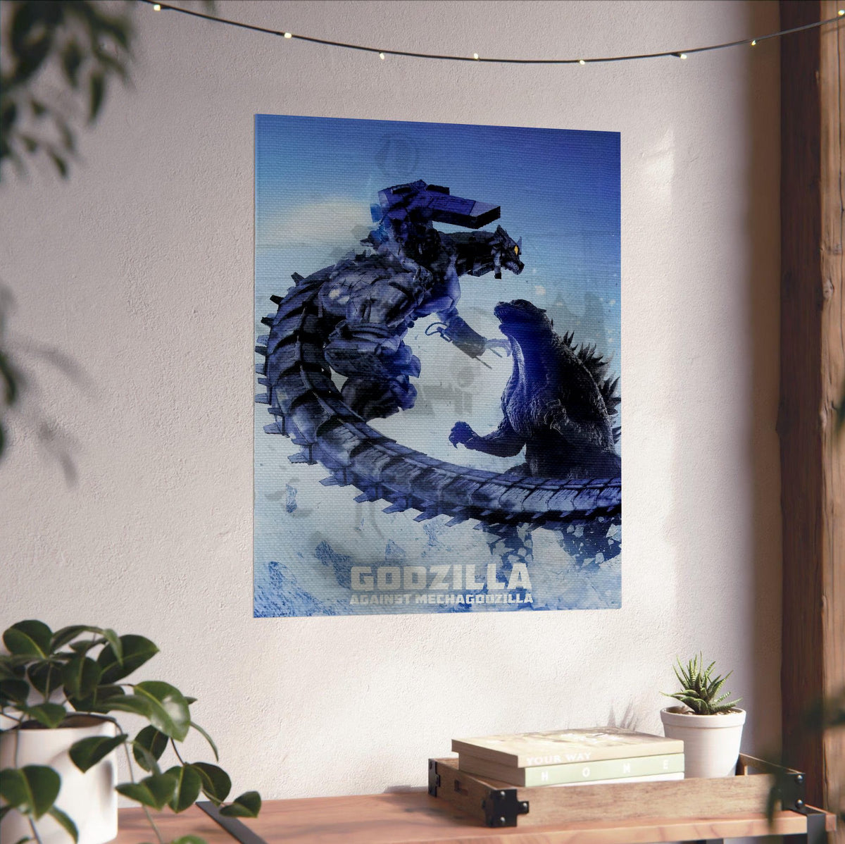 Godzilla Against MechaGodzilla (2002) Movie Key Art poster unframed on a white wall above a desk