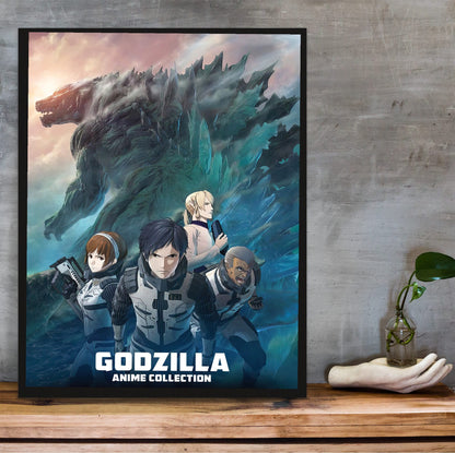 Godzilla Anime Trilogy Movie Collection Art poster in a black frame on a wooden shelf against concrete