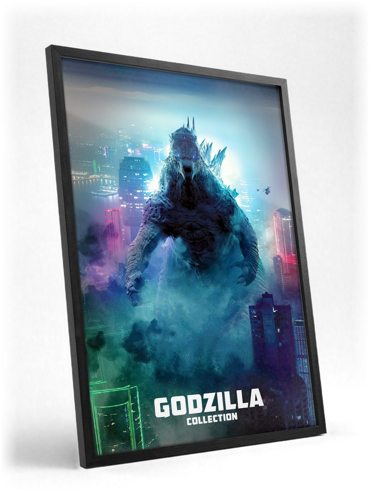Godzilla Complete Collection Movie Art poster in a black frame with glass leaning against a wall