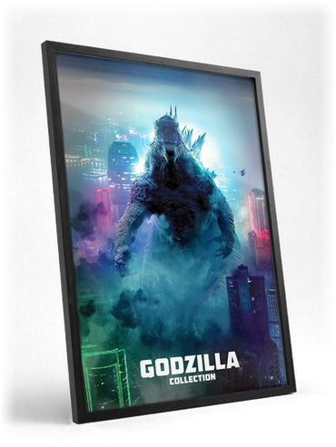 Godzilla Complete Collection Movie Art poster in a black frame with glass leaning against a wall