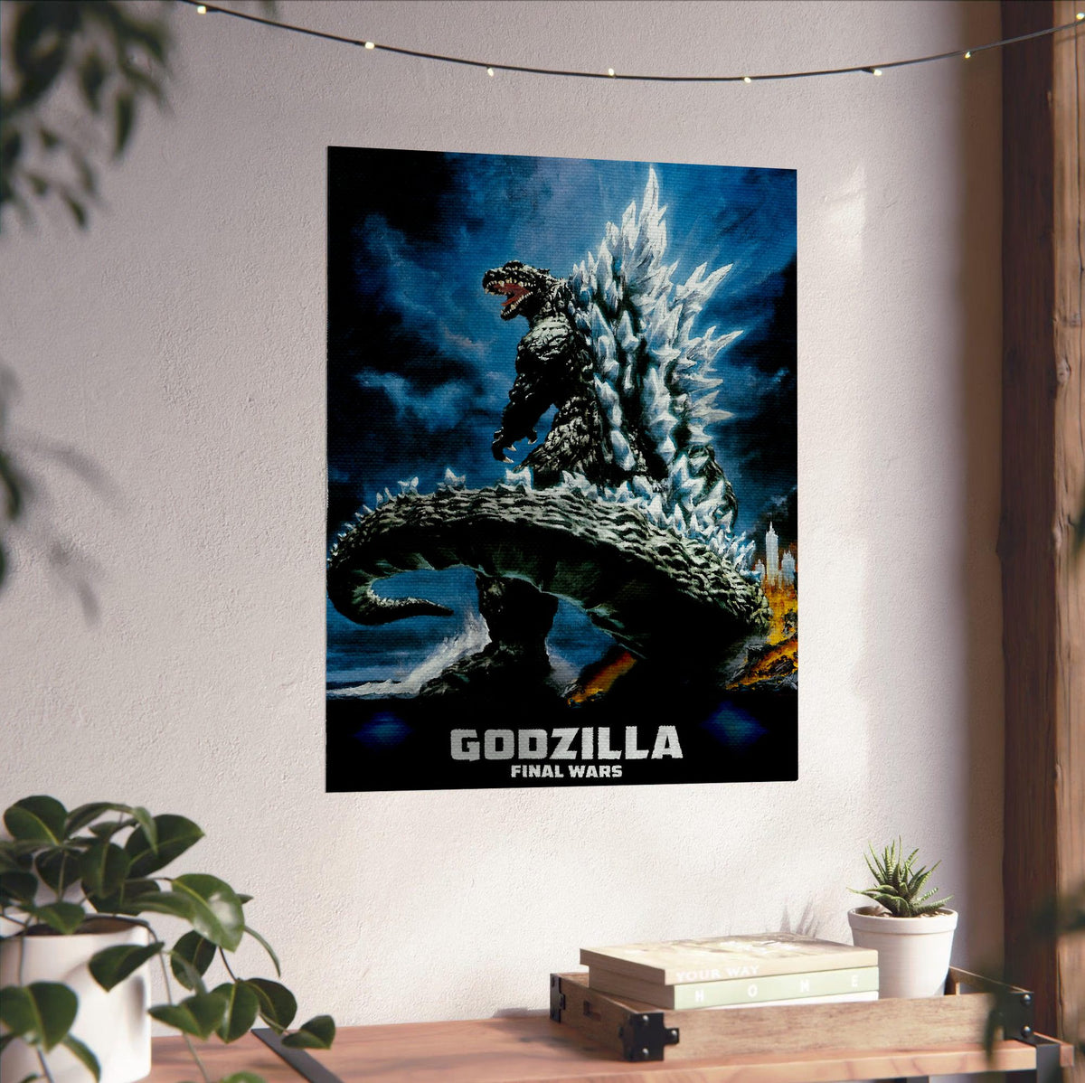 Godzilla: Final Wars (2004) Movie Key Art poster unframed on a white wall above a desk