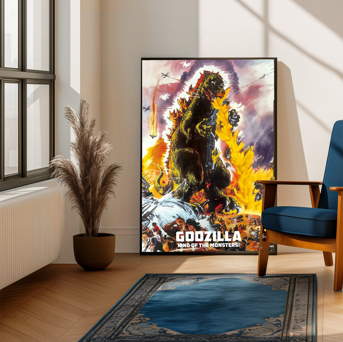Godzilla, King of the Monsters! (1956) Movie Illustrated Art poster framed beside a blue armchair in a sunlit room