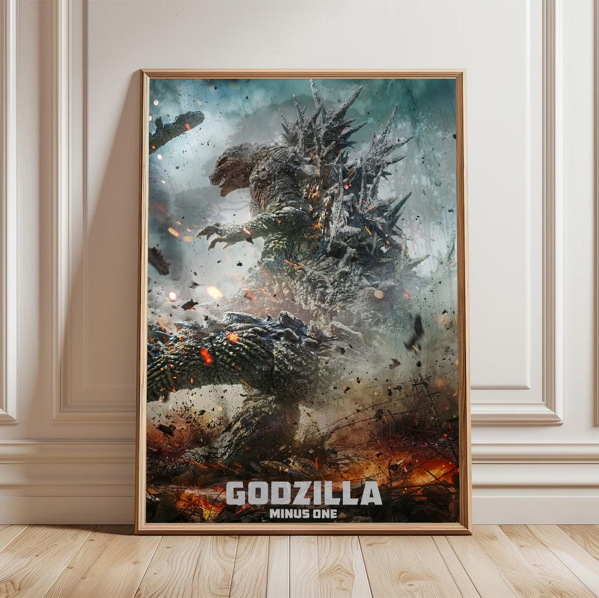 Godzilla Minus One (2023) Movie Key Art poster in a light oak frame leaning against a white wall