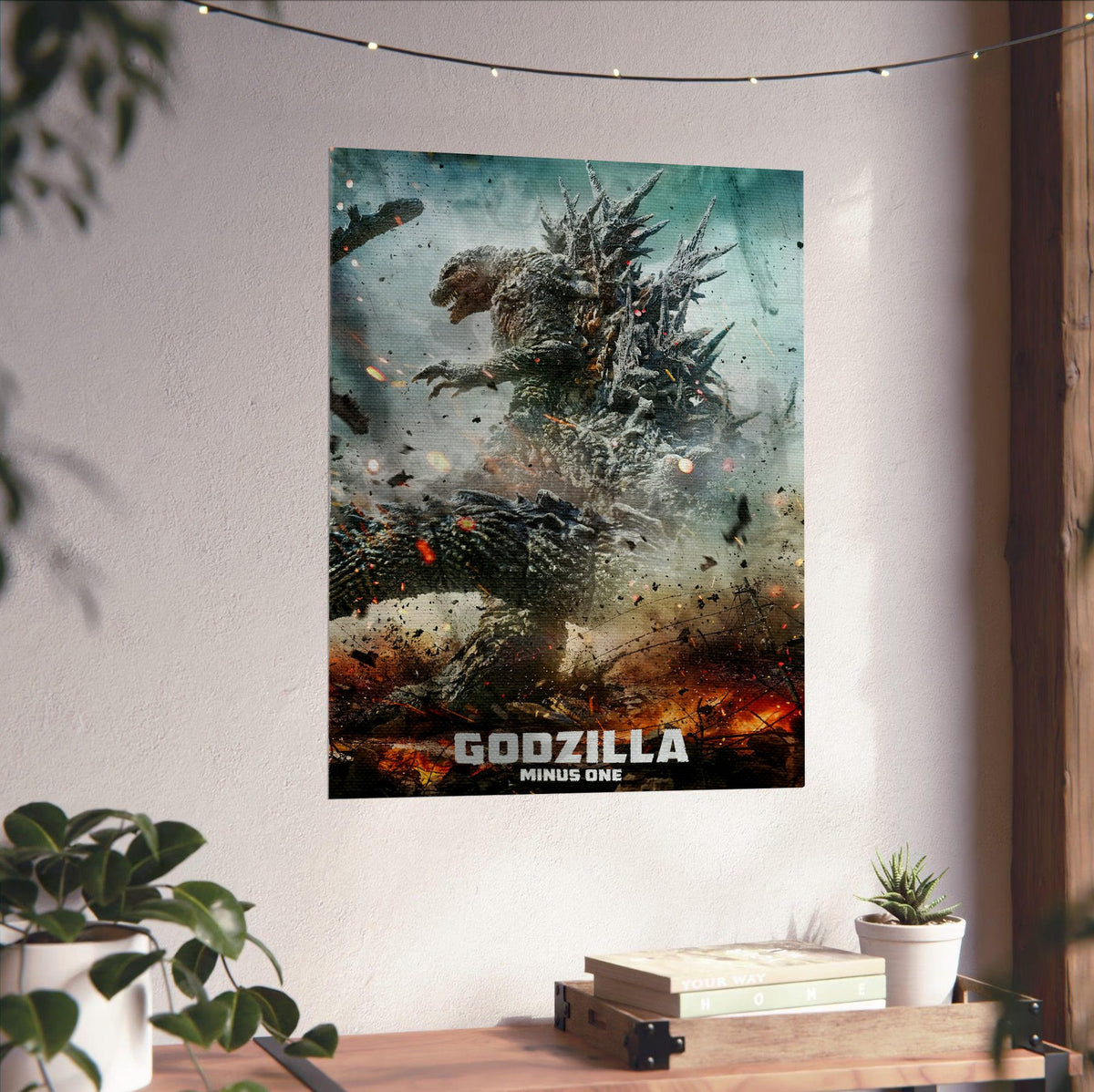 Godzilla Minus One (2023) Movie Key Art poster unframed on a white wall above a desk