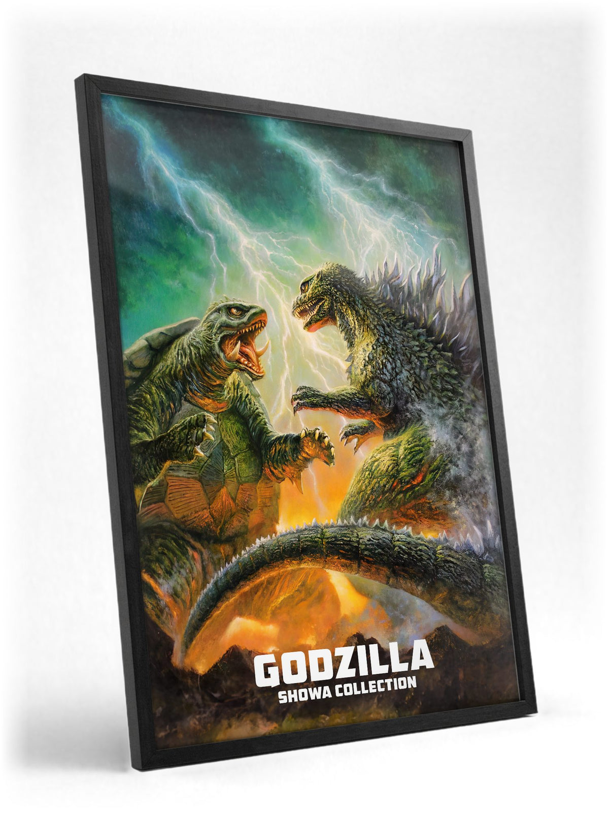 Godzilla Showa Era Movie Collection Art poster in a black frame with glass leaning against a wall
