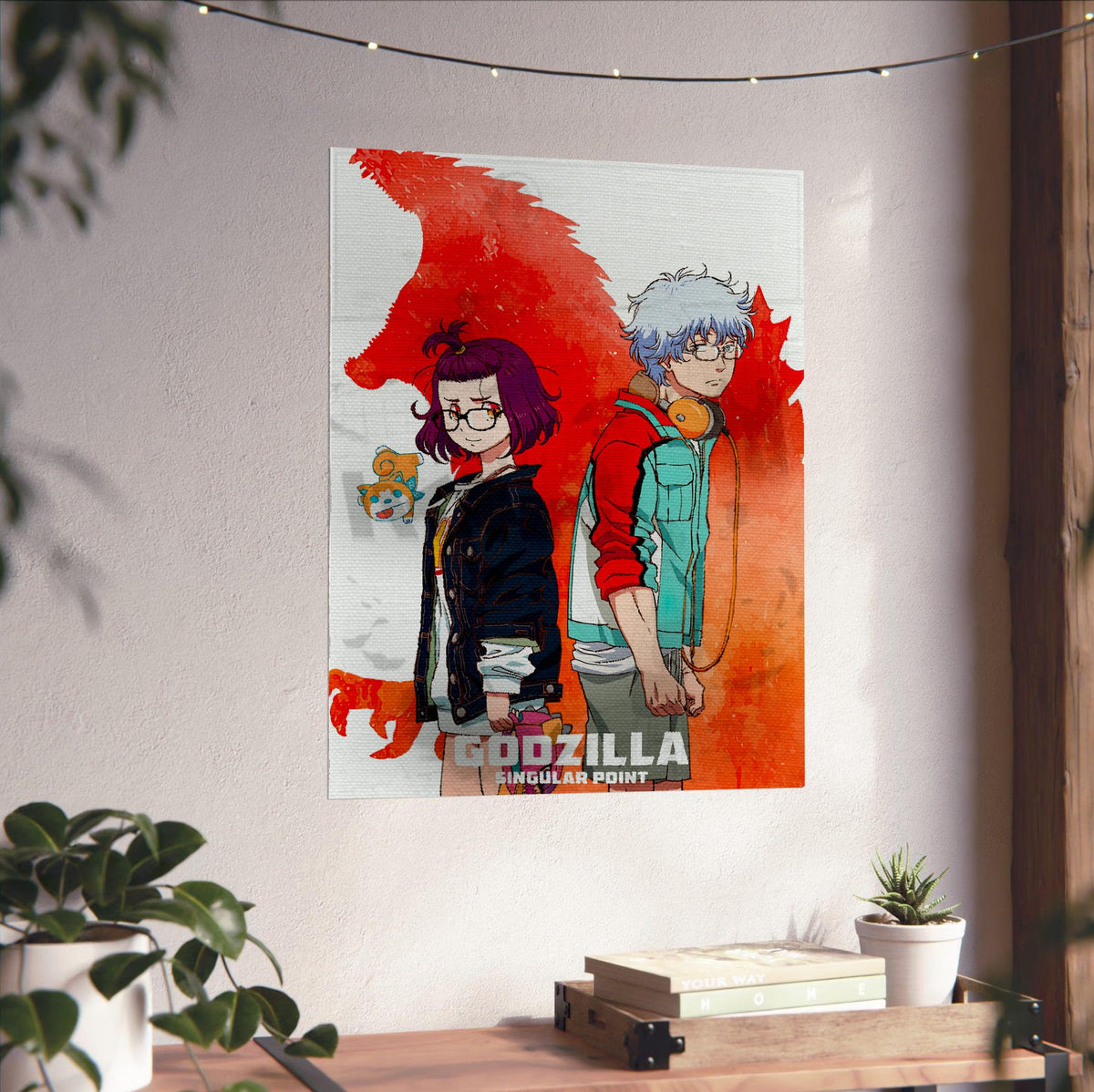 Godzilla Singular Point Key Art poster unframed on a white wall above a desk