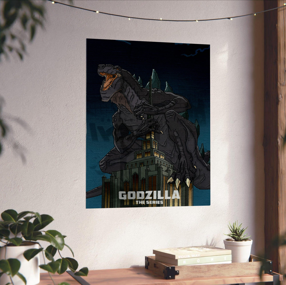 Godzilla: The Series Key Art poster unframed on a white wall above a desk