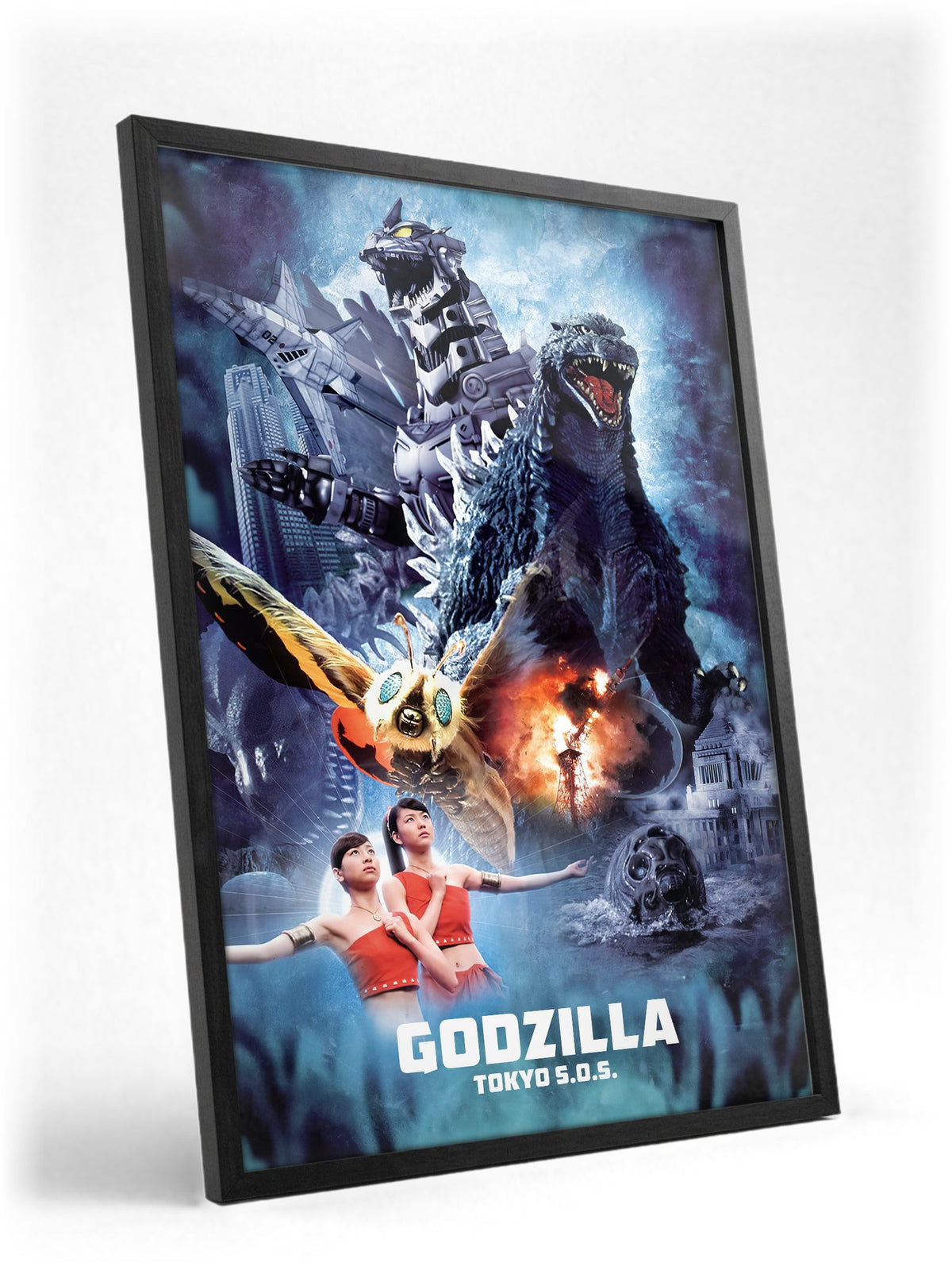 Godzilla: Tokyo S.O.S. (2003) Movie Key Art poster in a black frame with glass leaning against a wall
